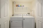 Washer & dryer on basement floor, delivers 12 cycles/5 temp settings